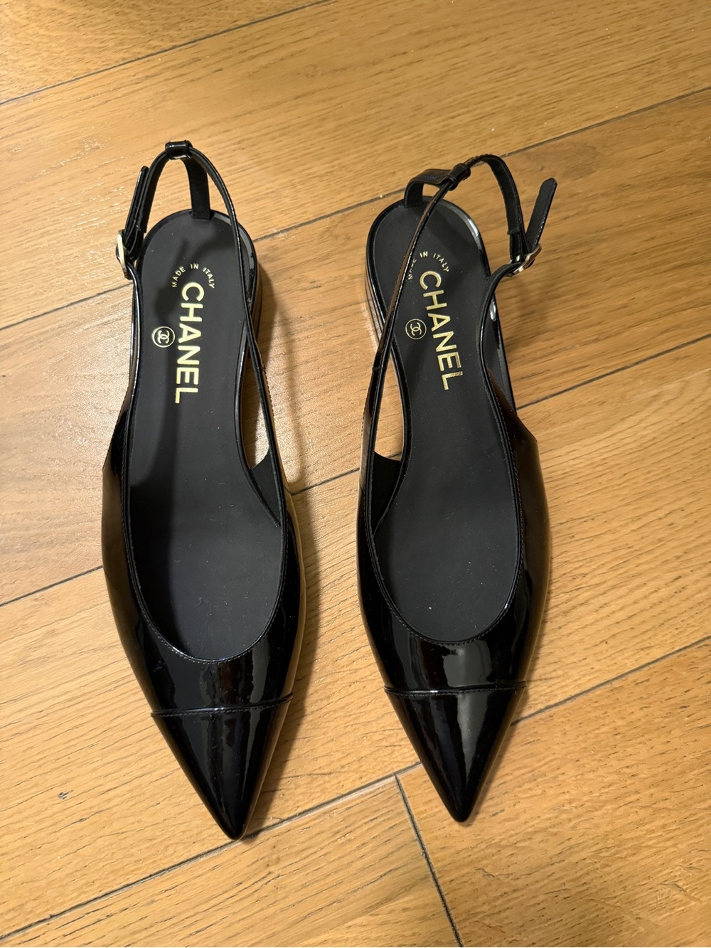CHANEL Black Patent Leather Pointed Slingback Flats with Gold Logo